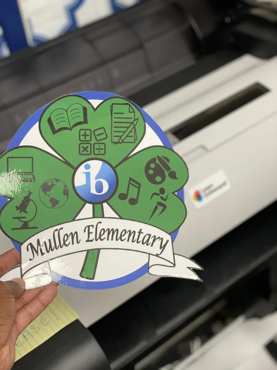 Die-cut Mullen Elementary clover sticker printed on a PSS Poster Maker